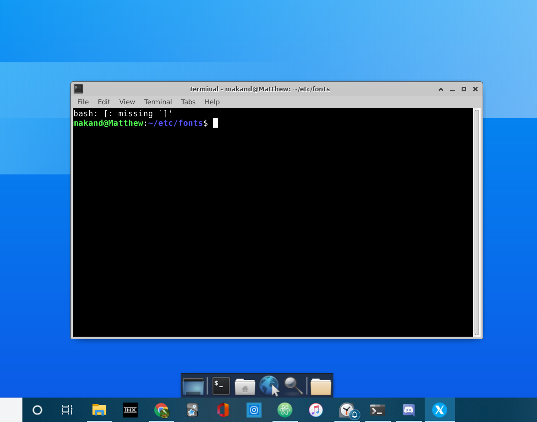 Image of Linux terminal running with Windows taskbar beneath